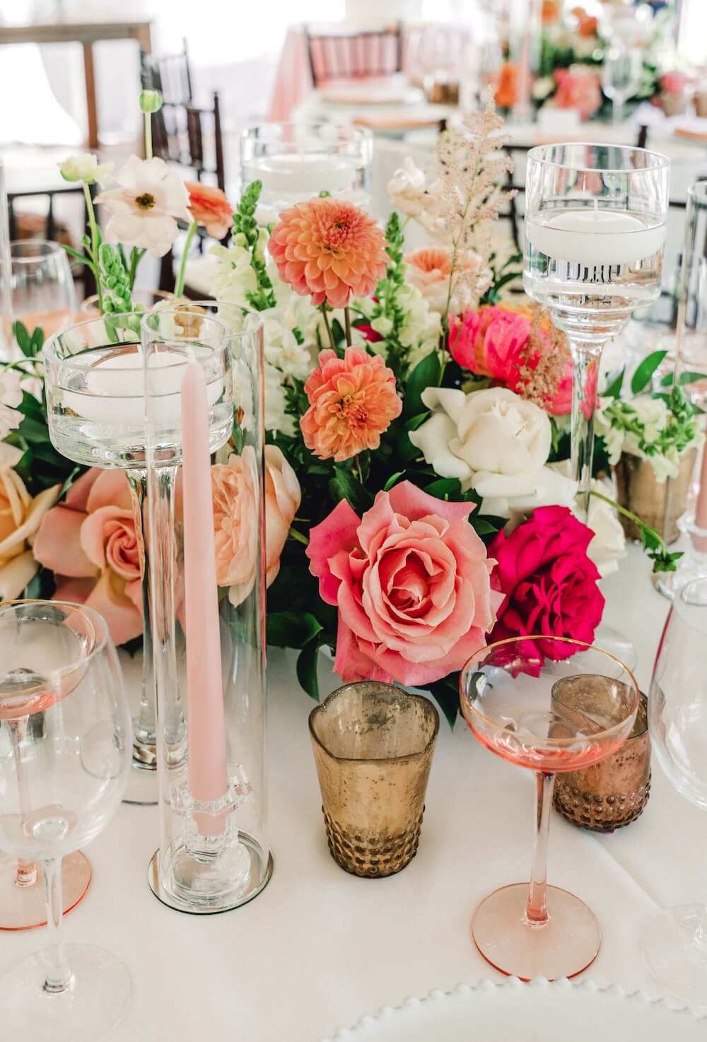 table settings at san diego wedding with hot pink and orange fun vibrant florals