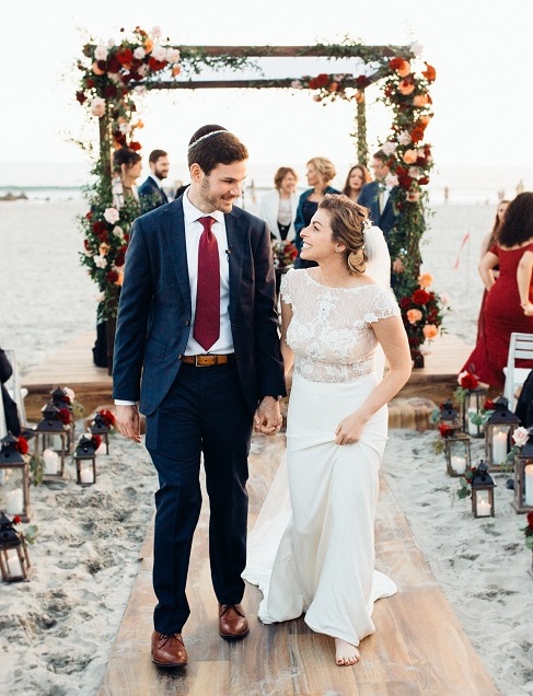 dark red and purple rich and dramatic ceremony florals for san diego wedding